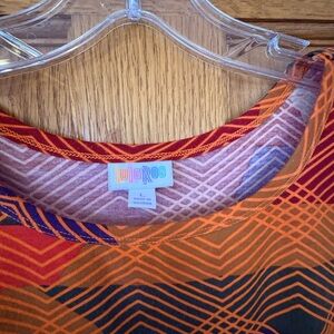 LuLaRoe Orange and Red Geometric Top